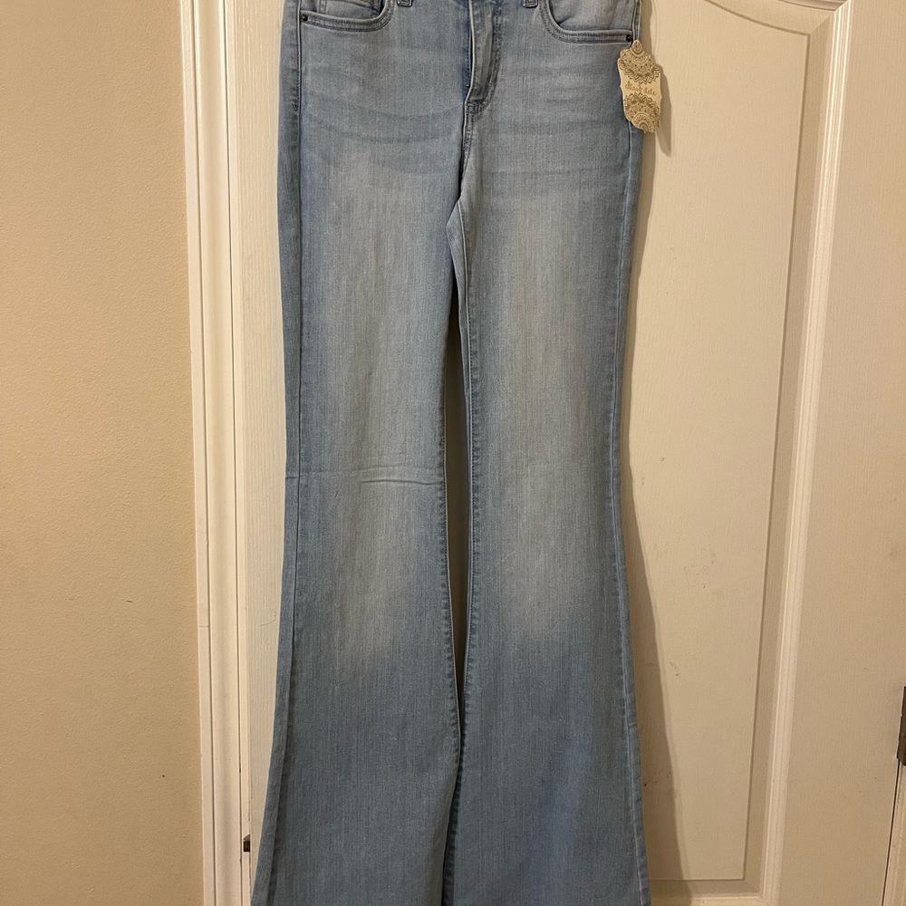 Light wash bell bottoms from Altar’d State